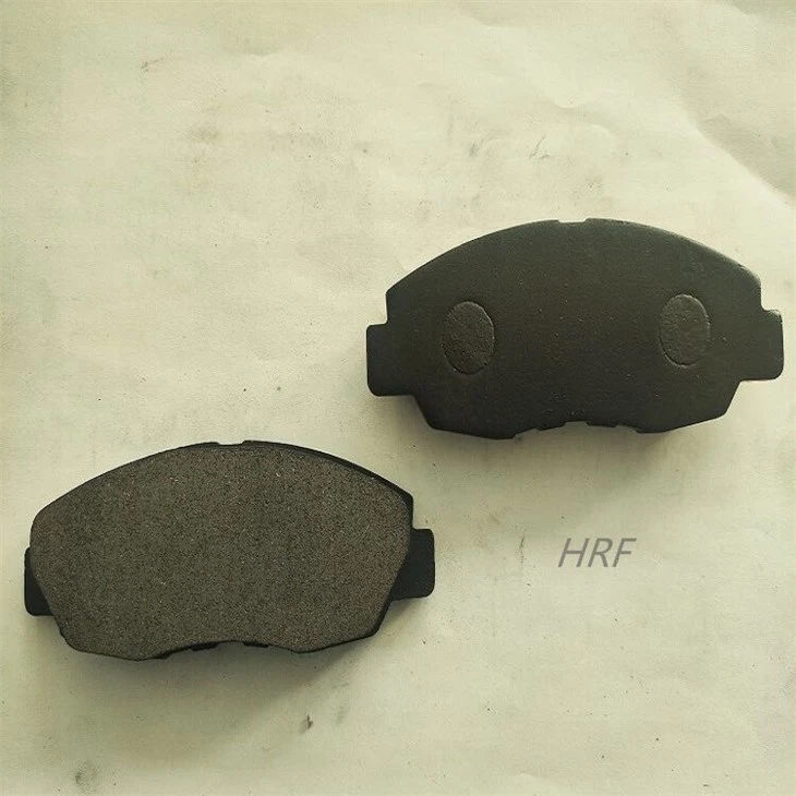 2 brake pads with  black coating